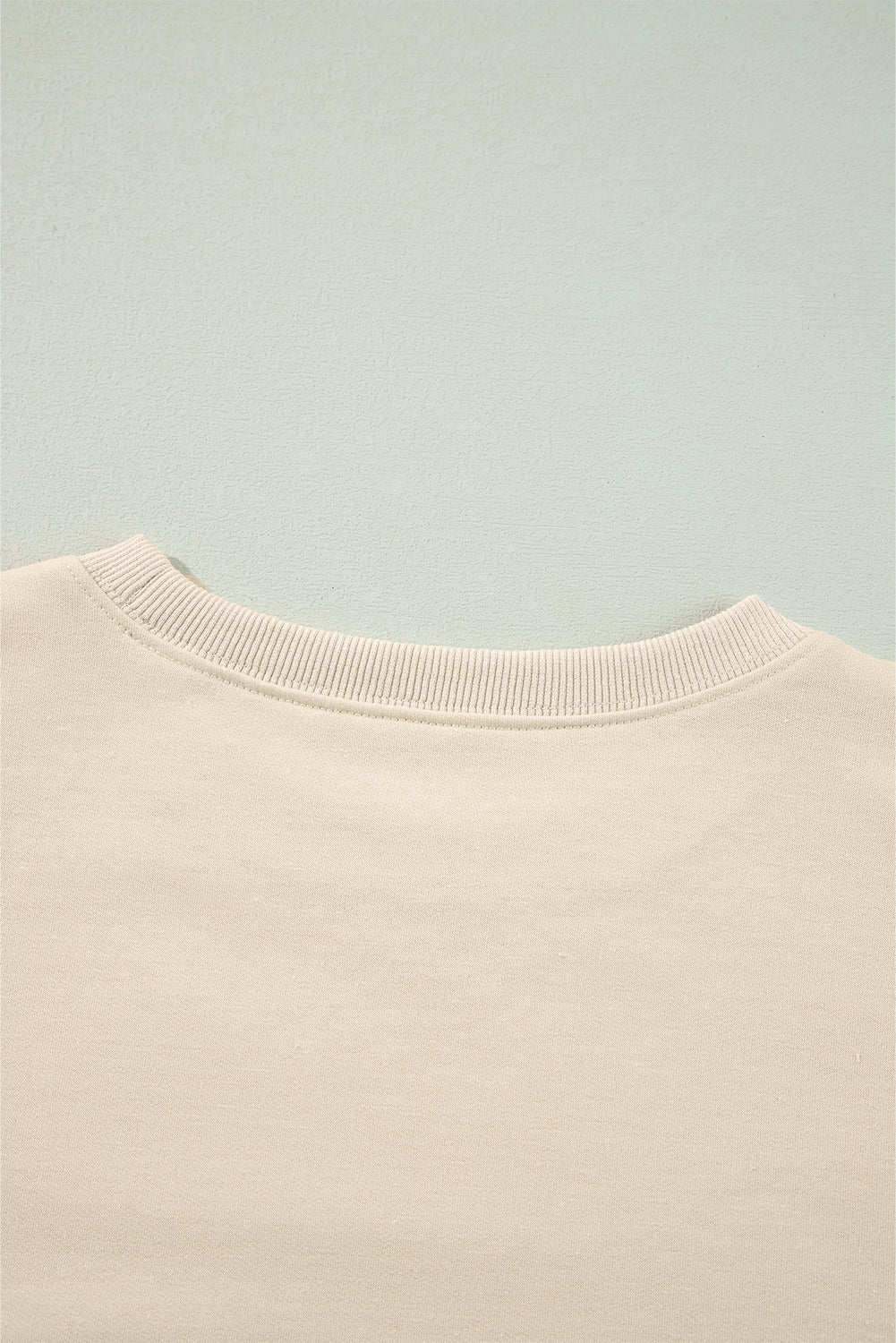 Jet Stream Solid Color Ruffled Shoulder Long Sleeve Blouse